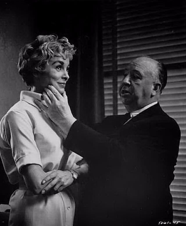 Alfred Hitchcock grabs Janet Leigh’s face on the set of “Psycho”