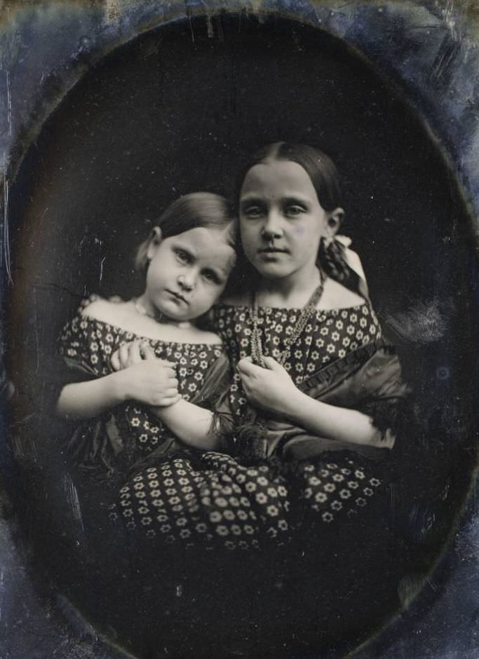 Two unidentified girls.