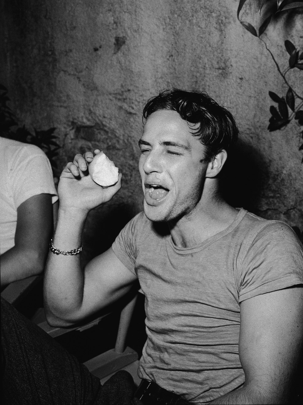 Marlon Brando having fun with an apple. During a break on the set of 'A Streetcar Named Desire,' 1951.