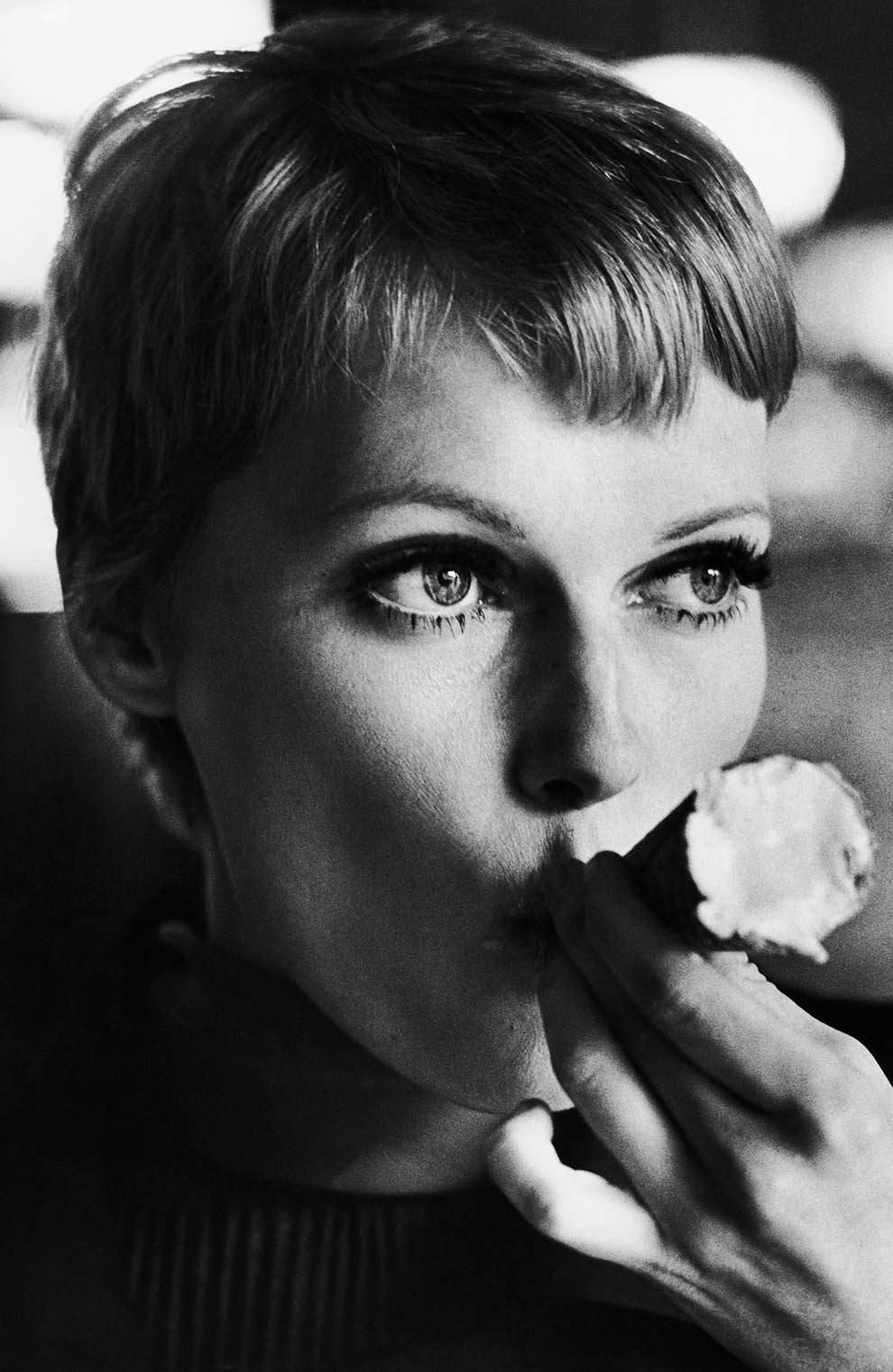 Mia Farrow getting a grip on her ice cream cone, 1977.