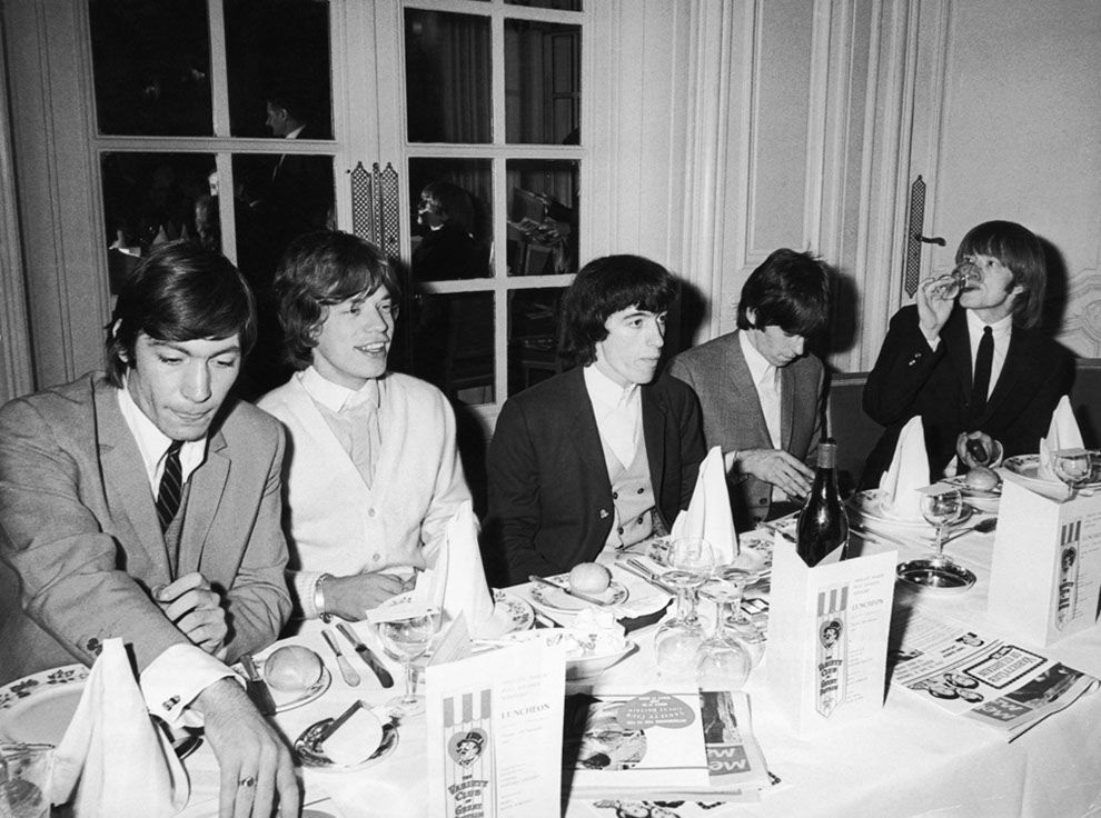 The Rolling Stones having dinner. At the Savoy Hotel in London on September 11th, 1964.