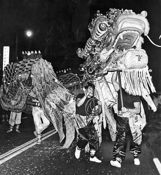 A dragon parades on North Broadway, celebrating the Chinese New Year, 1966.