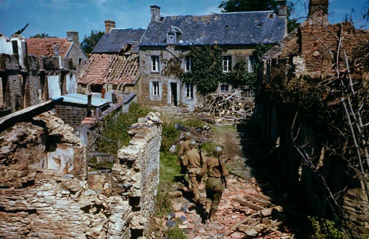 “We thought it was going to be murder but it wasn't. To show you how easy it was, I ate my bar of chocolate. In every other operational trip, I sweated so much the chocolate they gave us melted in my breast pocket.” — Frank Scherschel describing his experiences photographing the Normandy invasion from the air, before he joined Allied troops heading inland. Above: GIs search ruined homes in western France after D-Day.