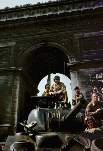 Tanks under the Arc de Triomphe in Paris during liberation celebrations, August 1944