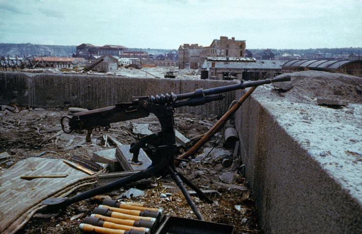 An abandoned German machine gun, France, June 1944