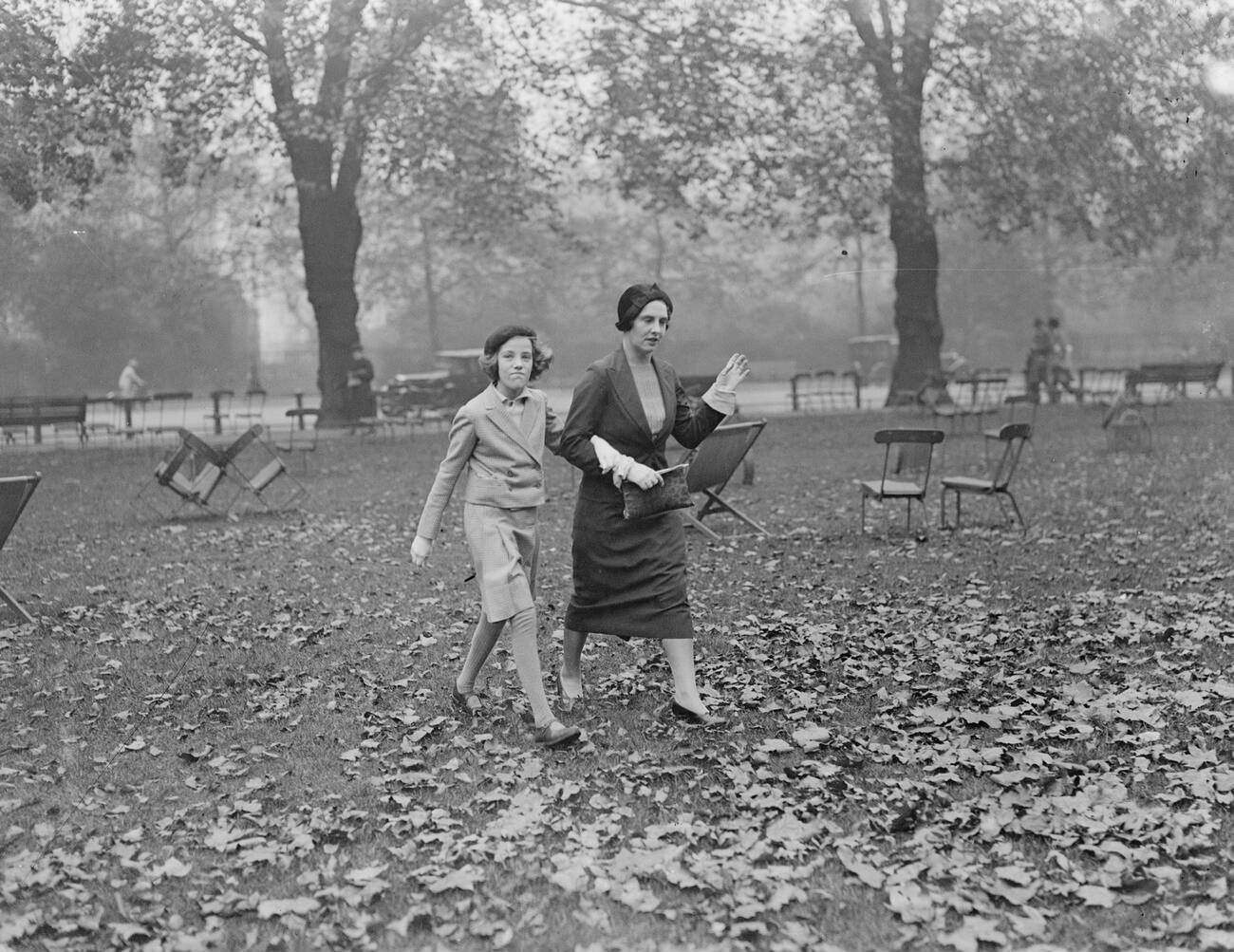 Lady Mary Cambridge amidst autumn leaves, 1934