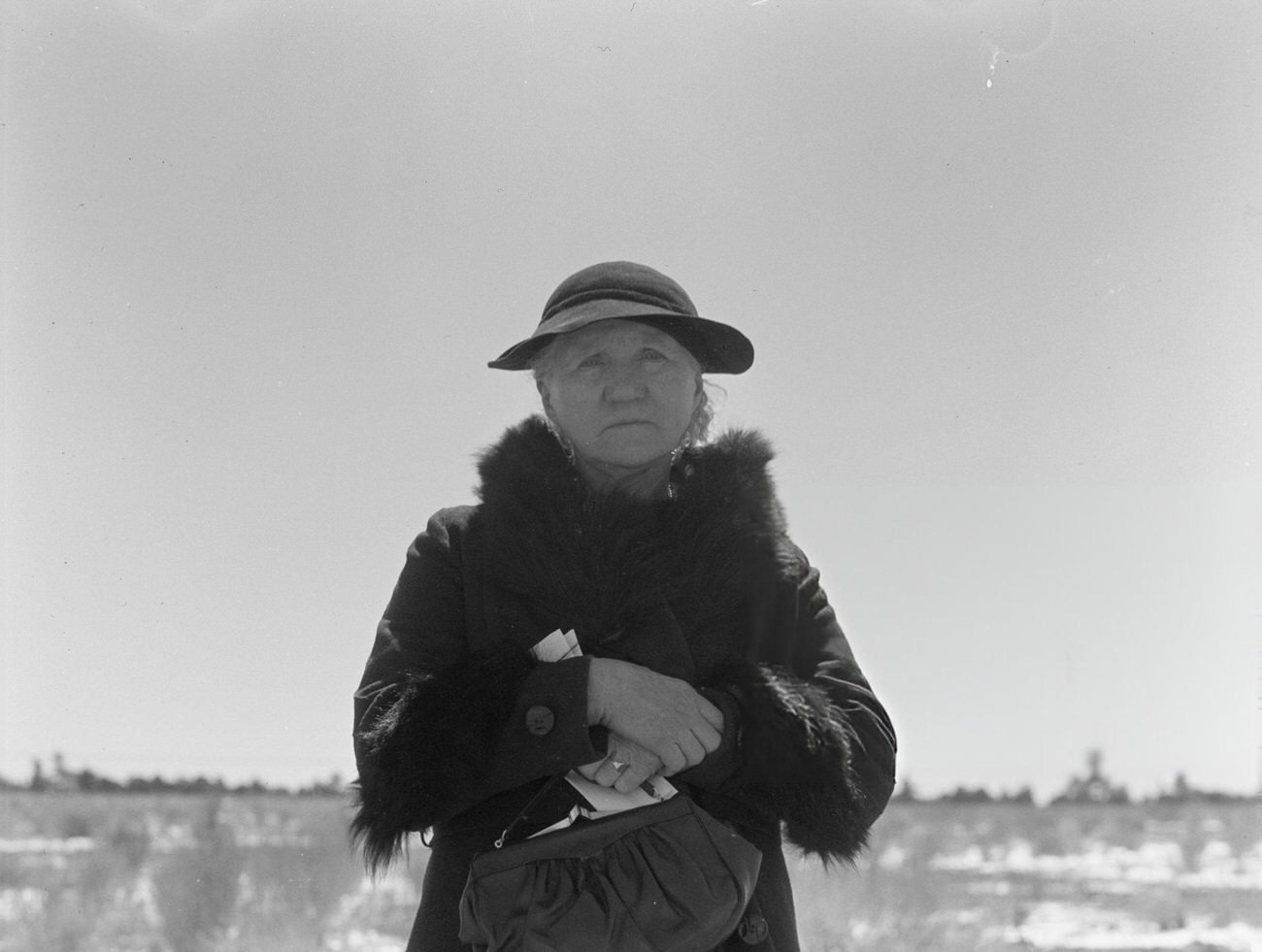 A Mormon woman from Denmark receiving an assistance check, Utah