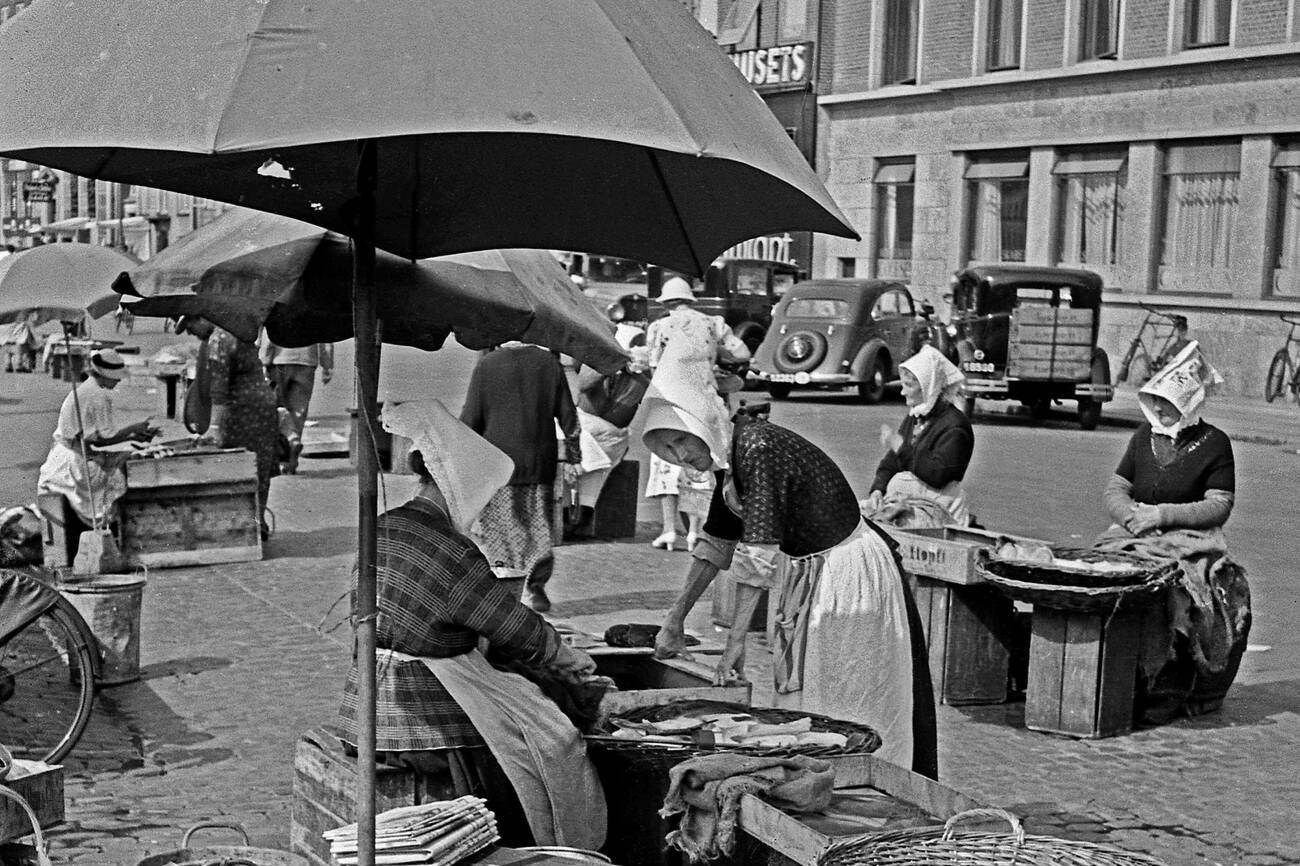 Women selling fish in a traditional costume, Copenhagen, Denmark, 1930s