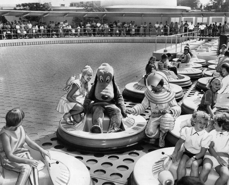 This very cool ride had large holes in the sieve-like floor that let through air and set the saucers spinning. Sadly, this ride only lasted about 5 years (potential litigation issues involving small children spitting out of the saucers spring to mind), 1961