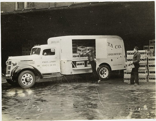 Model T 16 - A 7 Men are loading distilled water.