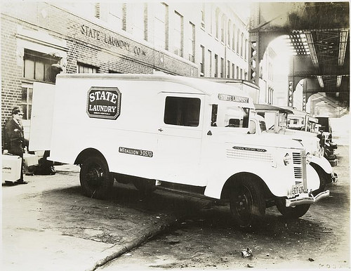 GMC van infront of State Laundry Co..