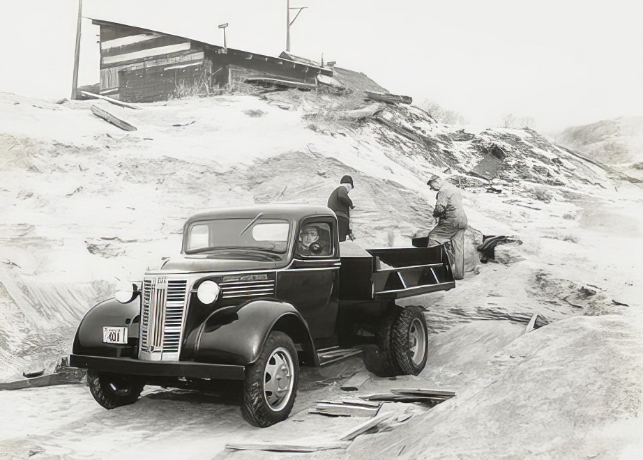 GM truck used by men in a quarry.