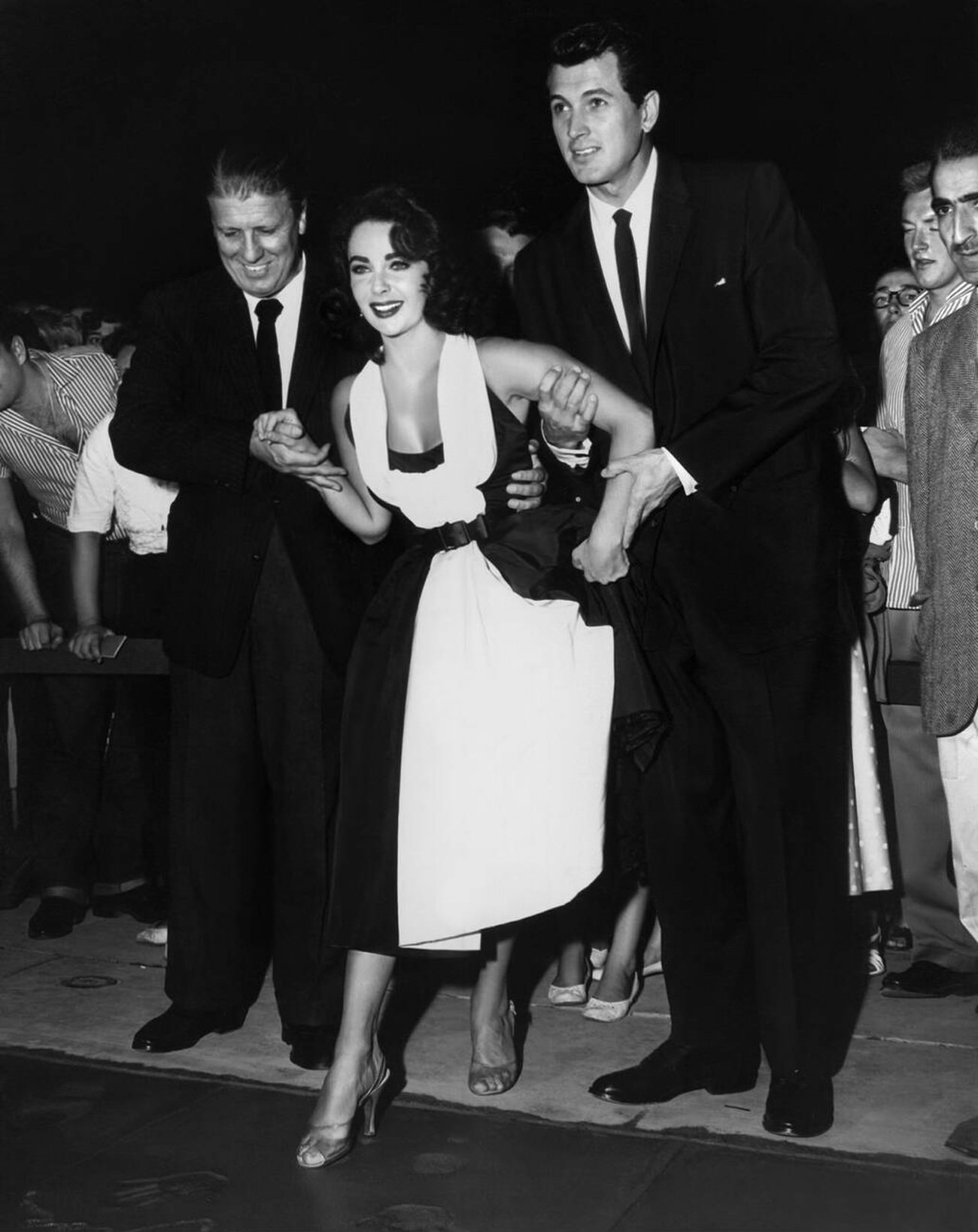 George Stevens, Elizabeth Taylor, and Rock Hudson at the ‘Giant’ premiere, 1956.