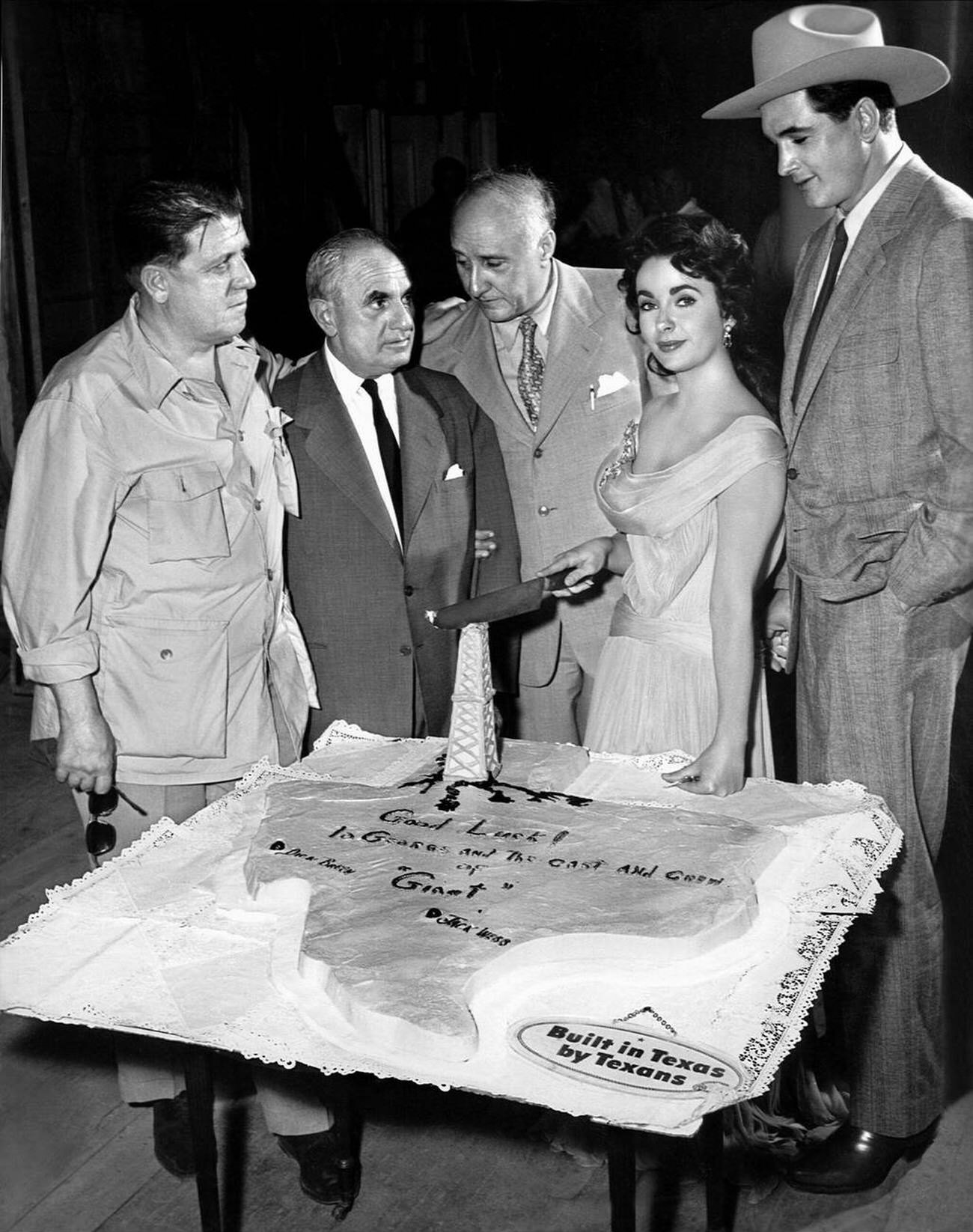 George Stevens, Dimitri Tiomkin, Elizabeth Taylor, and Rock Hudson on the set of ‘Giant’, 1956.