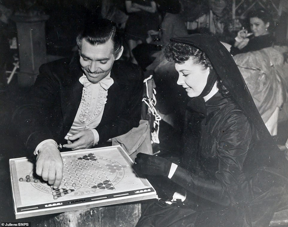 Clark Gable and Vivien Leigh playing a board game between filming scenes.