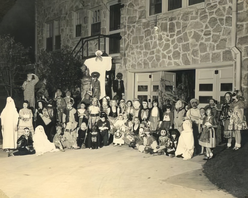 Kids gather for trick or treating, 1950