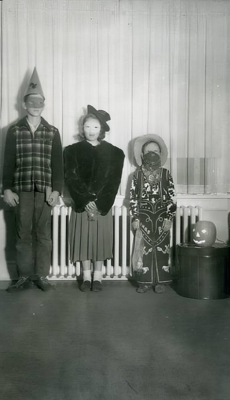 Kids lined up wearing outfits, 1958