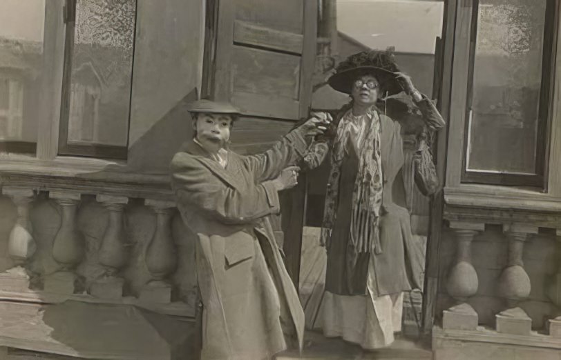 Adults in creepy masks, 1905