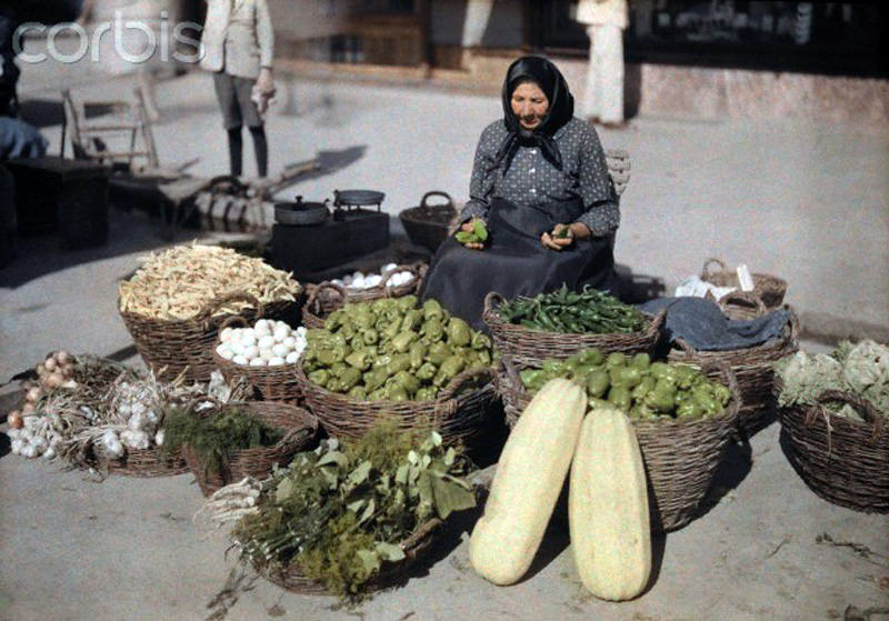 A peasant woman sells produce and eggs at the Szeged market, Hungary, January 1930.