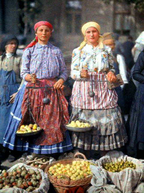 Two women sell fruit at the Mohacs market, Hungary, June 1932.