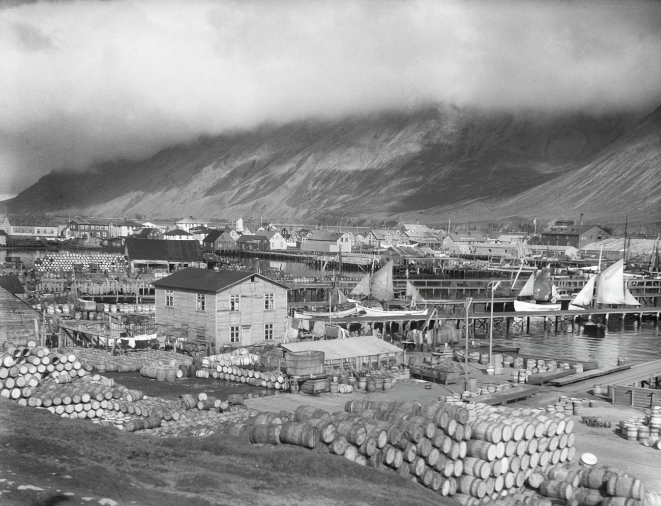 The harbor and herring processing sites in Siglufjordur, Iceland, 1935.