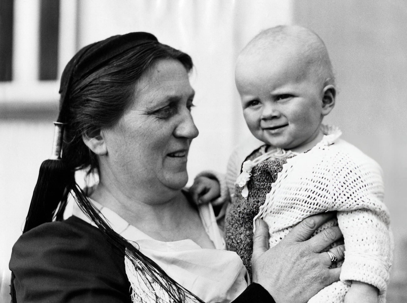 Gudrun Larnsdottir (member of parliament) with grandchild, Iceland, 1934.