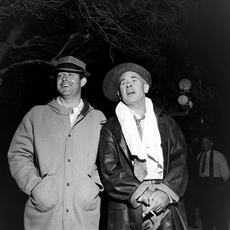 Director Frank Capra (right, with unidentified man) on the set of It's a Wonderful Life