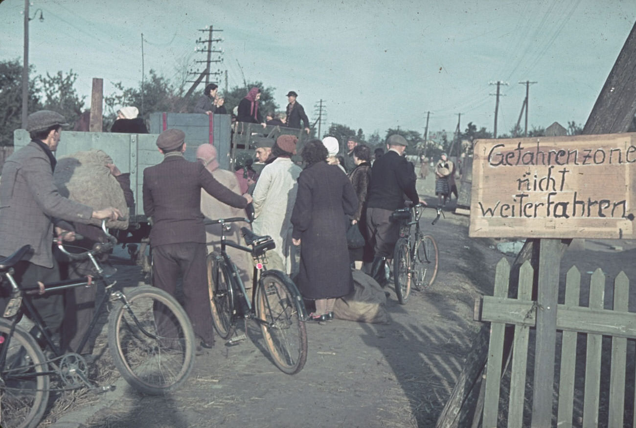 Warsaw, Nazi-occupied Poland, 1940. The sign warns: "Danger zone, do not proceed."