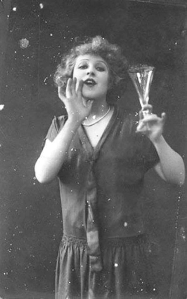 Raising a Glass to the New Year: Vintage Photos of Ladies Enjoying a Drink in the Early 1900s