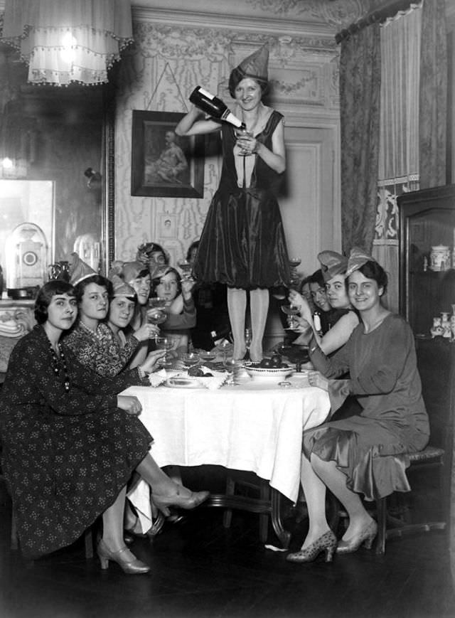 Raising a Glass to the New Year: Vintage Photos of Ladies Enjoying a Drink in the Early 1900s