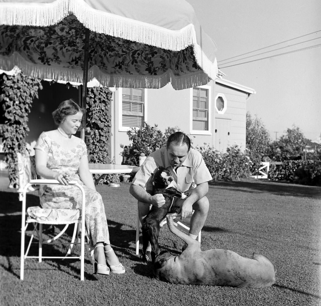 Mickey Cohen with his wife, LaVonne, at home in Los Angeles, 1949.