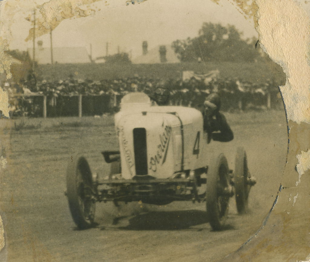 Don Harkness at the wheel of his Overland Sports car Whitey at race meeting, 1920 - 1929