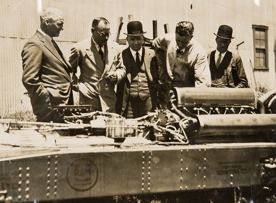 Men inspecting the car F.H. Stewart Enterprise, 1926 - 1936