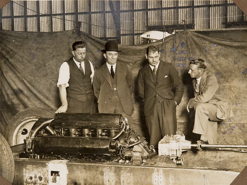 Group inspecting the car F.H. Stewart Enterprise