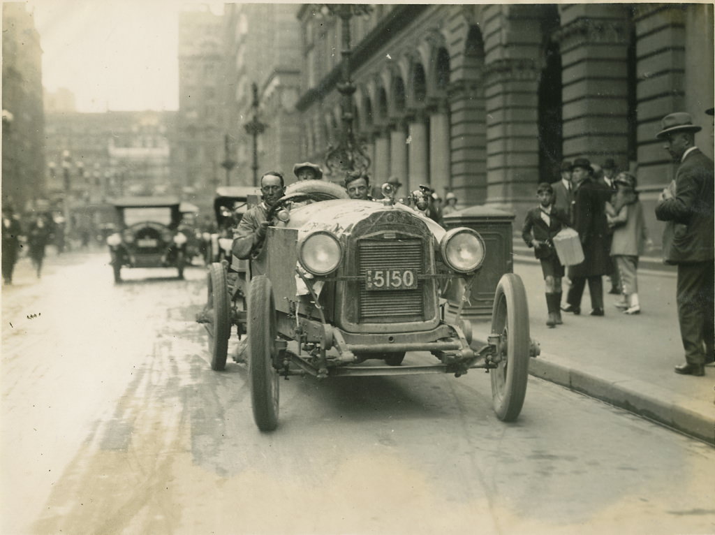 Dave Carrigan at wheel of a Willys Knight car, 1926