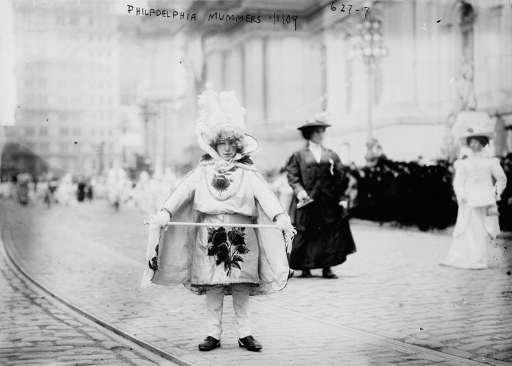 The Mummers Parade: various groups in elaborate costumes and performances.