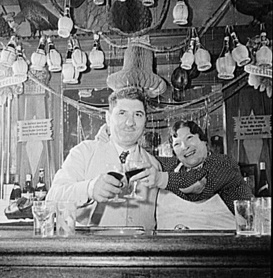 The DiCostanzo family's New Year's Eve dinner at their Mulberry Street restaurant, New York City, 1942.