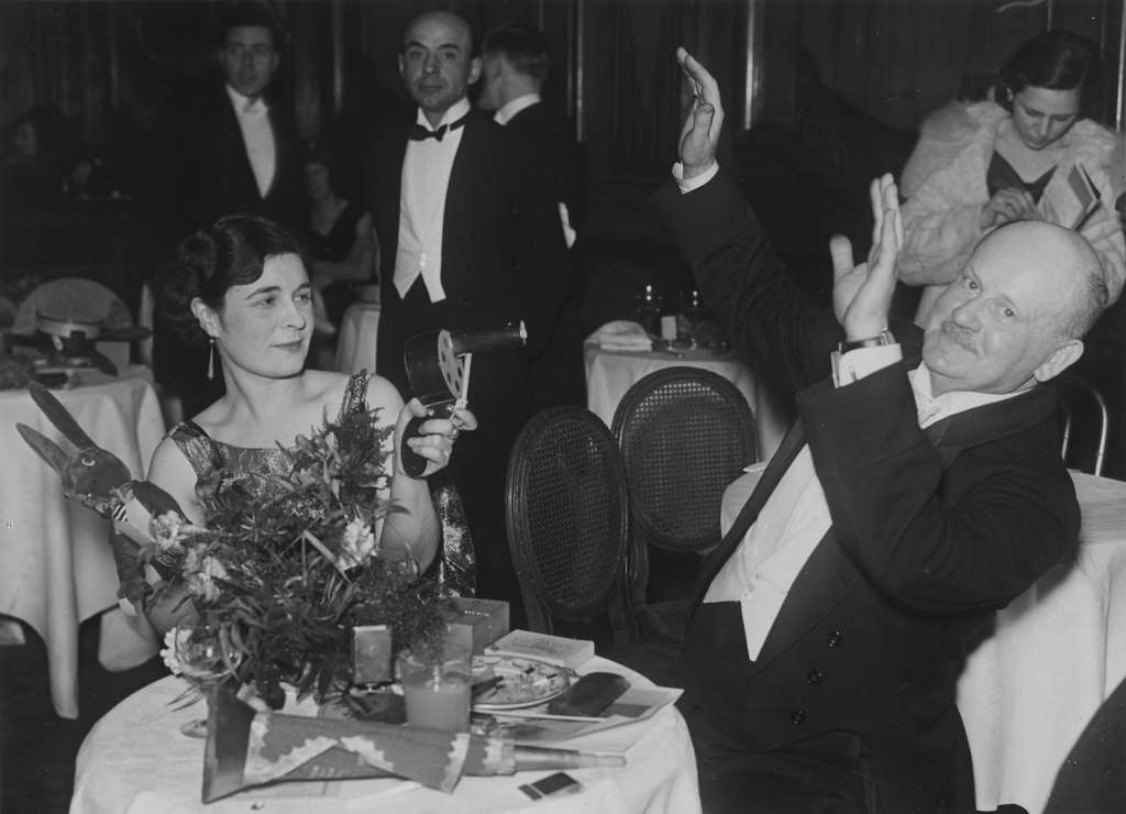 Revelers celebrating New Year's Eve at the Piccadilly Restaurant, London, 1931.