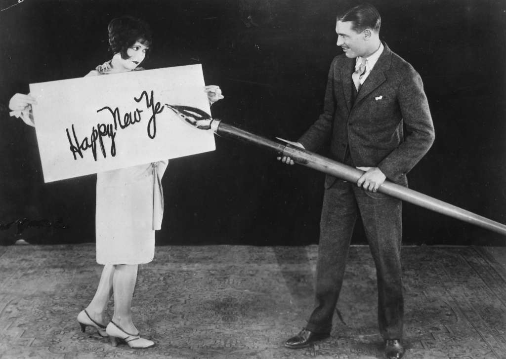 Clara Bow and Larry Gray exchanging New Year's greetings, 1935.