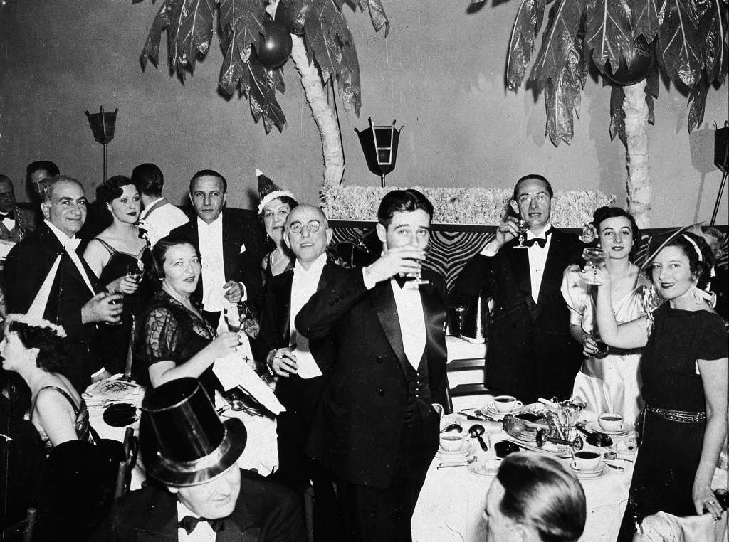 People in formal attire celebrating New Year's Eve at the El Morocco nightclub, New York City, 1935.