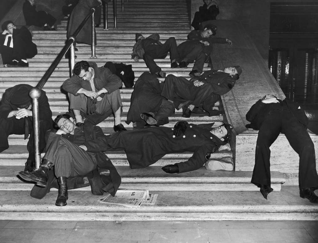 Revelers recovering from New Year's Eve celebrations at Grand Central Station, New York City, 1940.