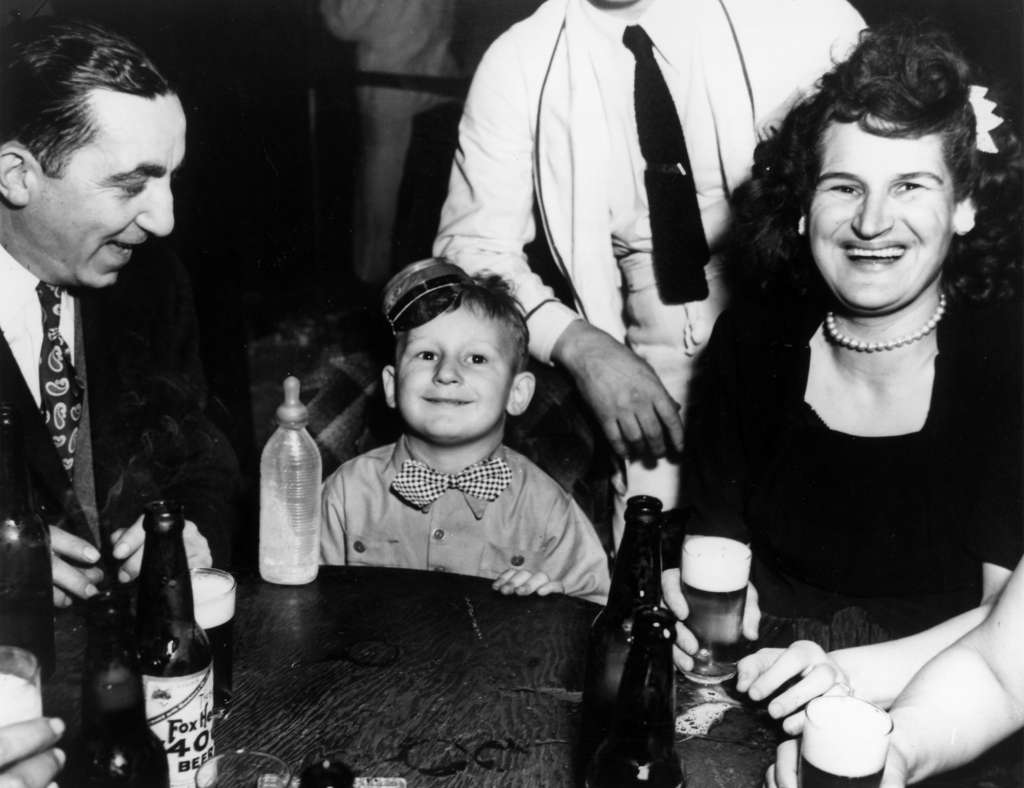 A three-year-old boy celebrating New Year's Eve at a New York nightclub, 1943.