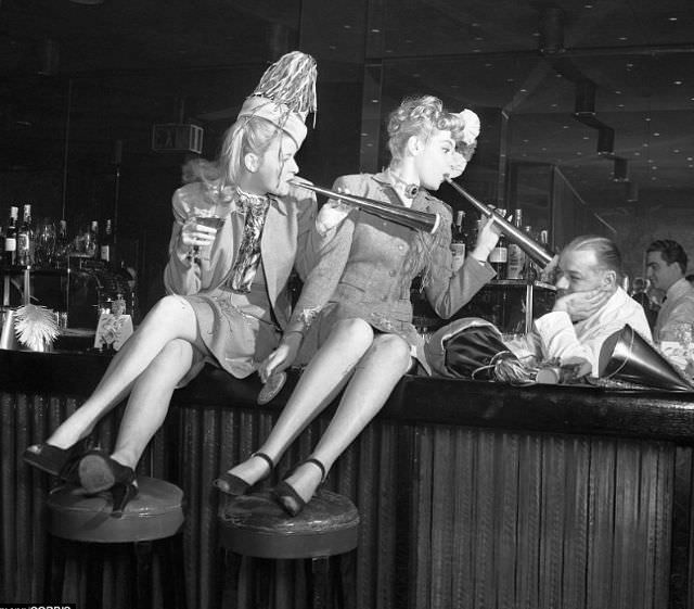 Jerry Therrien, bartender at the Copacobana, unable to be cheered up, 1946.