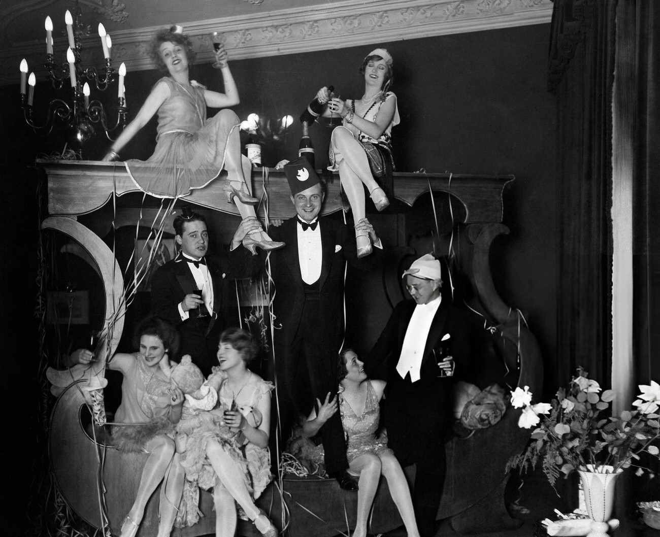 Lilian Harvey, Camilla Horn, Max Hansen, Willi Fritsch, Wilhelm Bendow, Leni Riefenstahl, Christ Tordy, and Olga Tschechova at a New Year's Eve party, 1927.