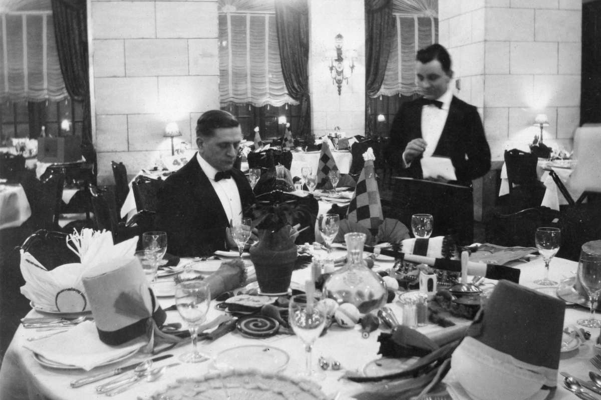 A man dining alone at the Gibson Hotel in Cincinnati, Ohio, on New Year's Eve, 1925.