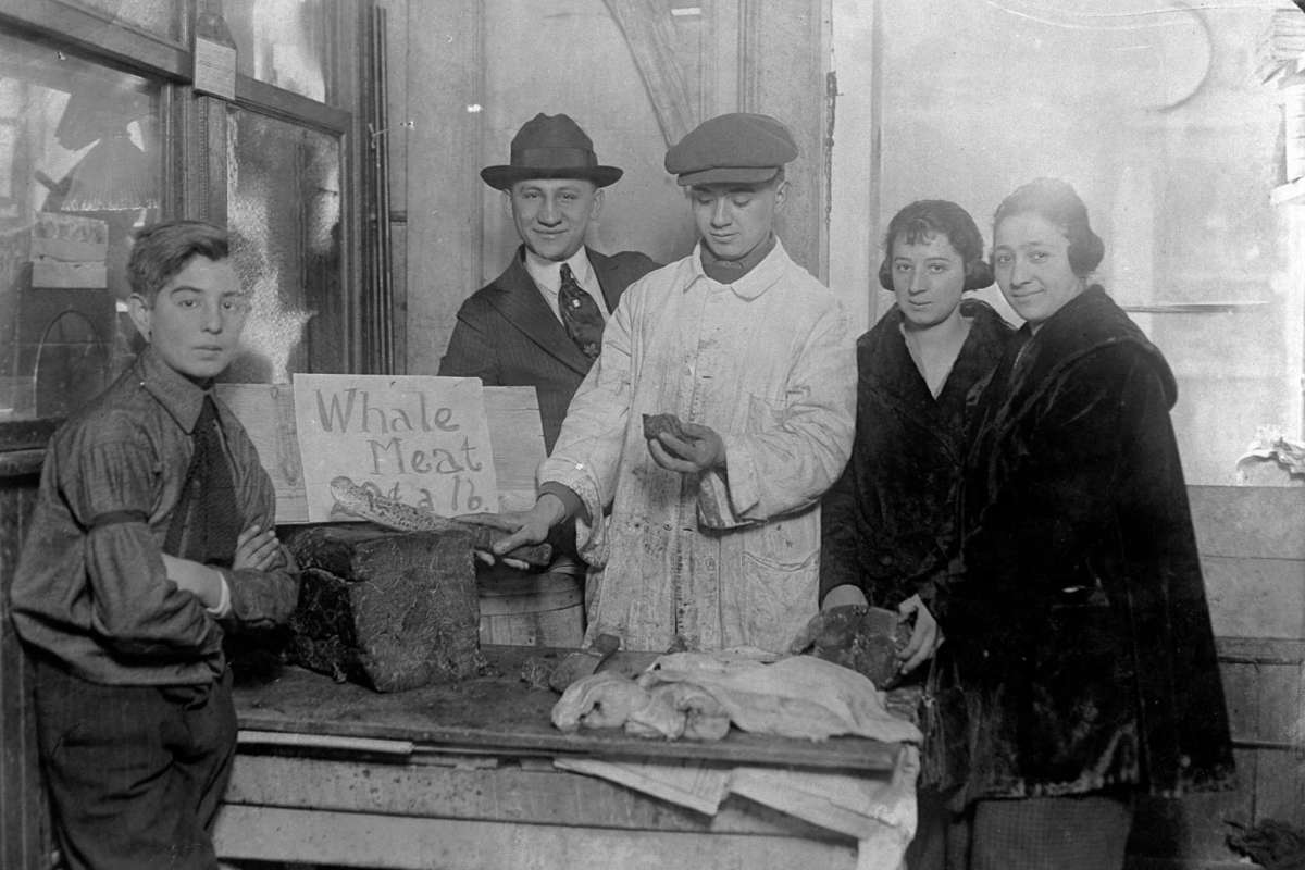 A New York butcher selling whale meat, 1920s.