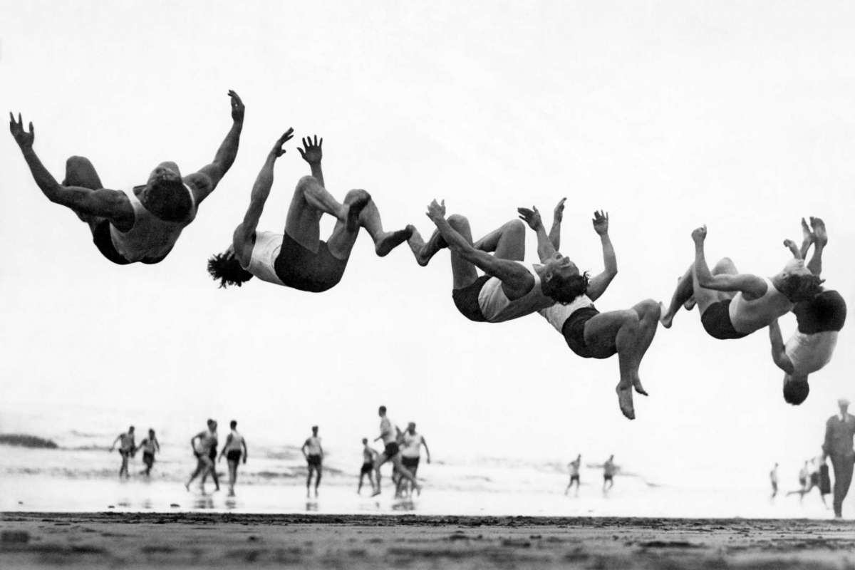 Members of the Olympic Club jumping into the Pacific Ocean, 1932.