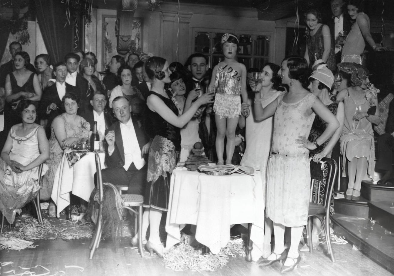 A young girl named "Miss 1926" at a New Year's party, 1926.