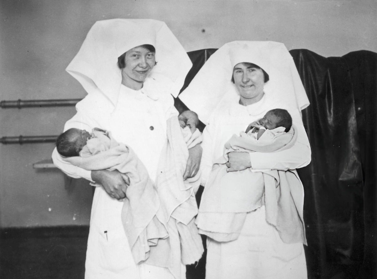 Nurses with newborn babies at the City of London Maternity Home, 1929.