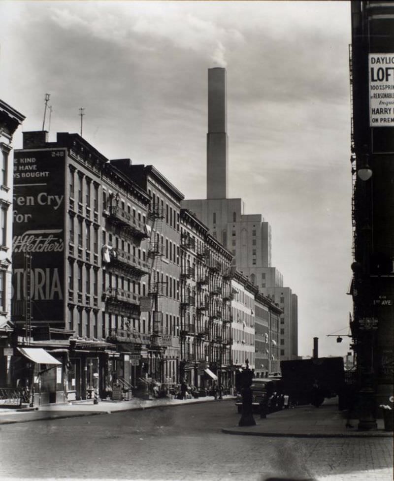 First Avenue and East 70th Street, Manhattan. Looking east (?) toward New York Hospital (?), apartments, lofts, businesses on 70th in the foreground.